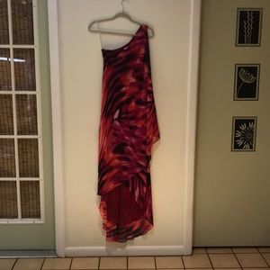 A one shoulder, flowy, high-low dress.